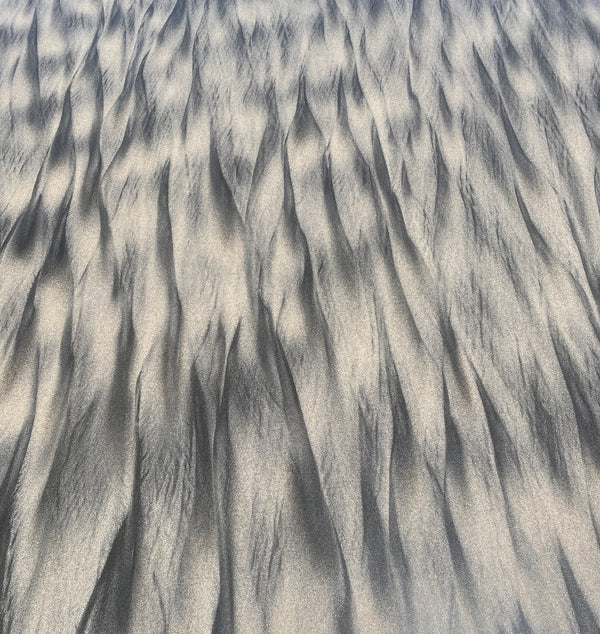 Abstract fine art photography print of wind and tide sculpted sand patterns at Waihi Beach New Zealand printed on washi paper