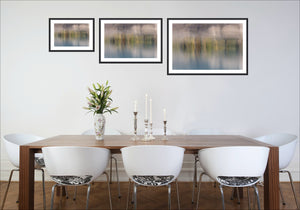 Whispers on Water abstract fine art photography print displayed in three sizes in a dining room